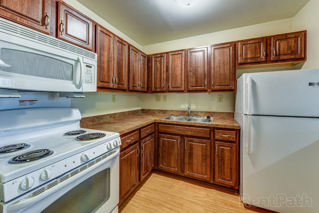 Kitchen with wood cabinets